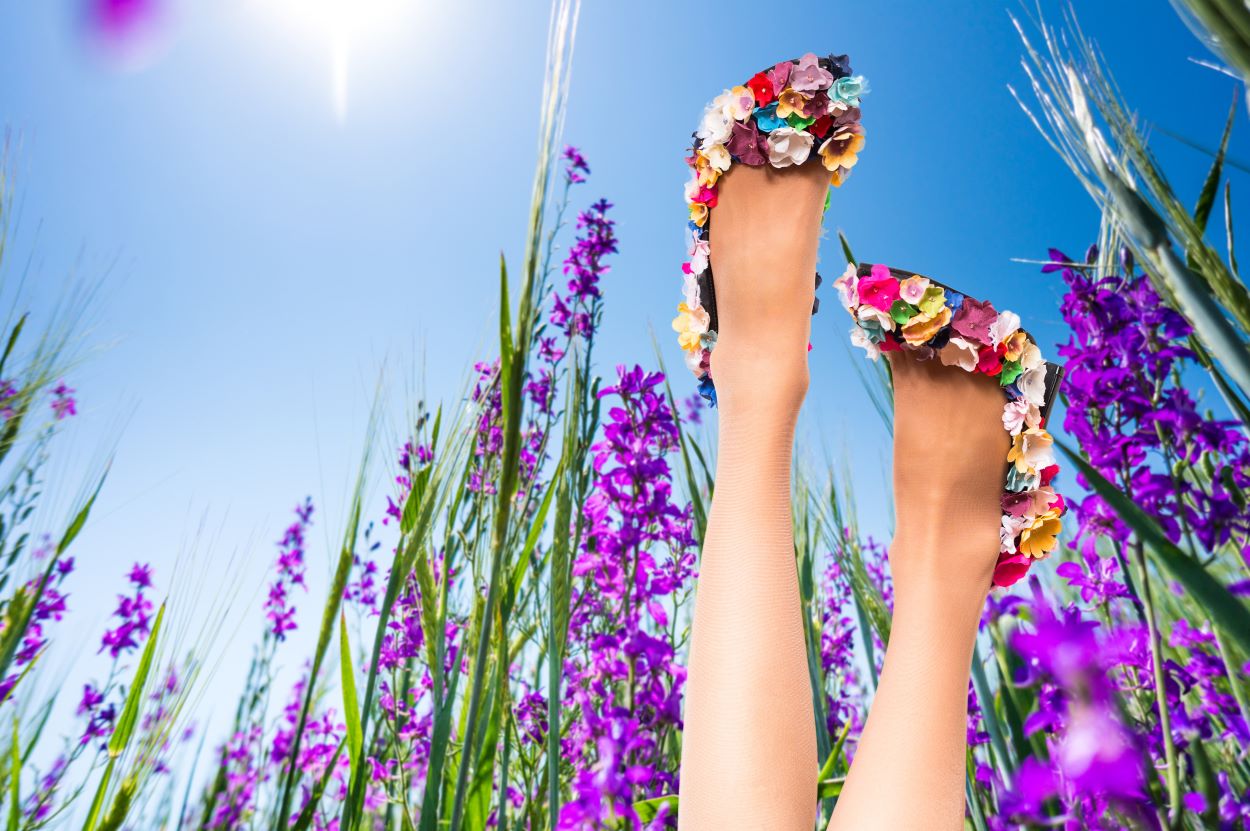 usra, first day of spring, flower covered shoes in the air surrounded by flowers